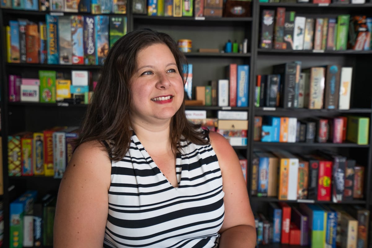 Patricia Gonzalez, the owner of Athena Board Game Cafe at 1418 W. Howard St. in Chicago, Ill., in the playing area of her business. Photo by Camilla Forte/Borderless Magazine