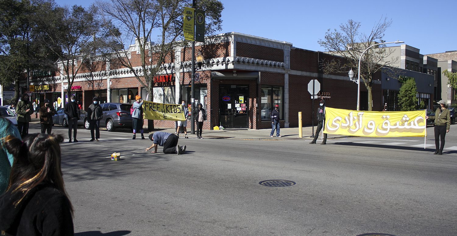 People outside Heartland Alliance's Bronzeville facility for unaccompanied minors in Chicago
