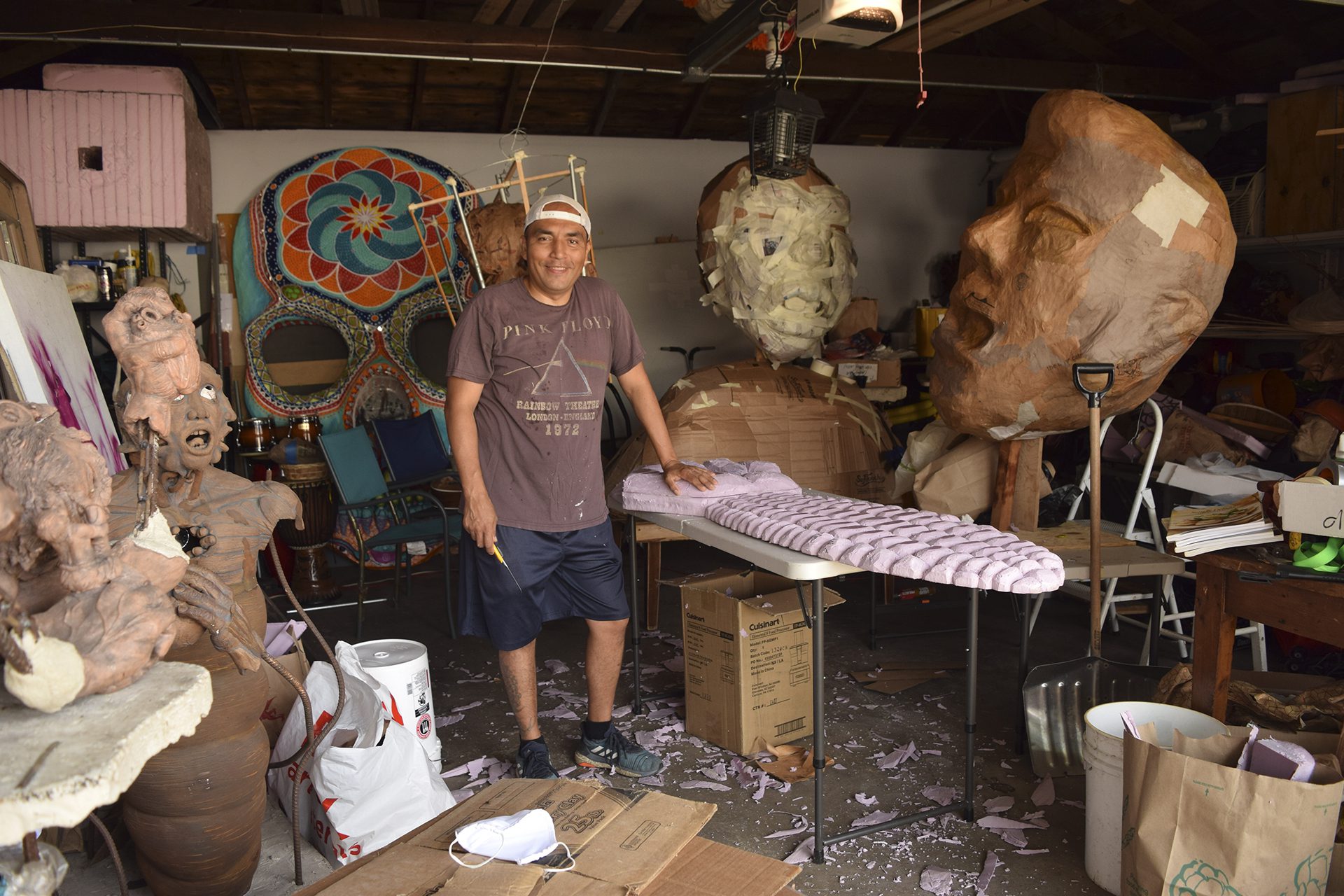 Piloto Nieves Ruiz, sculptor and artist, in the studio with sculptures