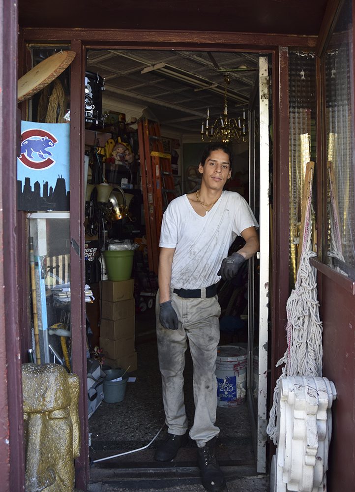 Mike with gloves on and a white t-shirt